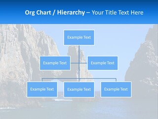 A Large Rock Formation In The Middle Of A Body Of Water PowerPoint Template