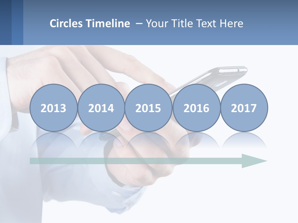 A Man Holding A Cell Phone In His Hand PowerPoint Template