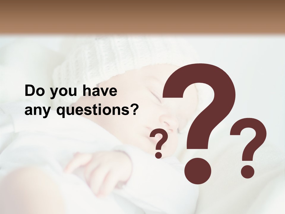 A Baby Sleeping On A Bed With A White Hat PowerPoint Template