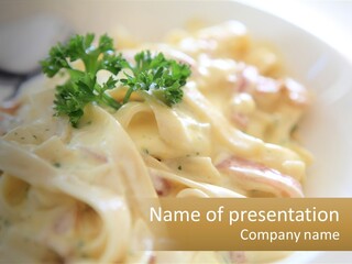 A Plate Of Pasta With Parsley On Top Of It PowerPoint Template