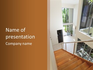 A Staircase Leading Up To A Window In A House PowerPoint Template