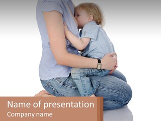 A Woman Holding A Baby In Her Arms PowerPoint Template