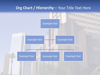 A Tall Building With A Blue Sky In The Background PowerPoint Template