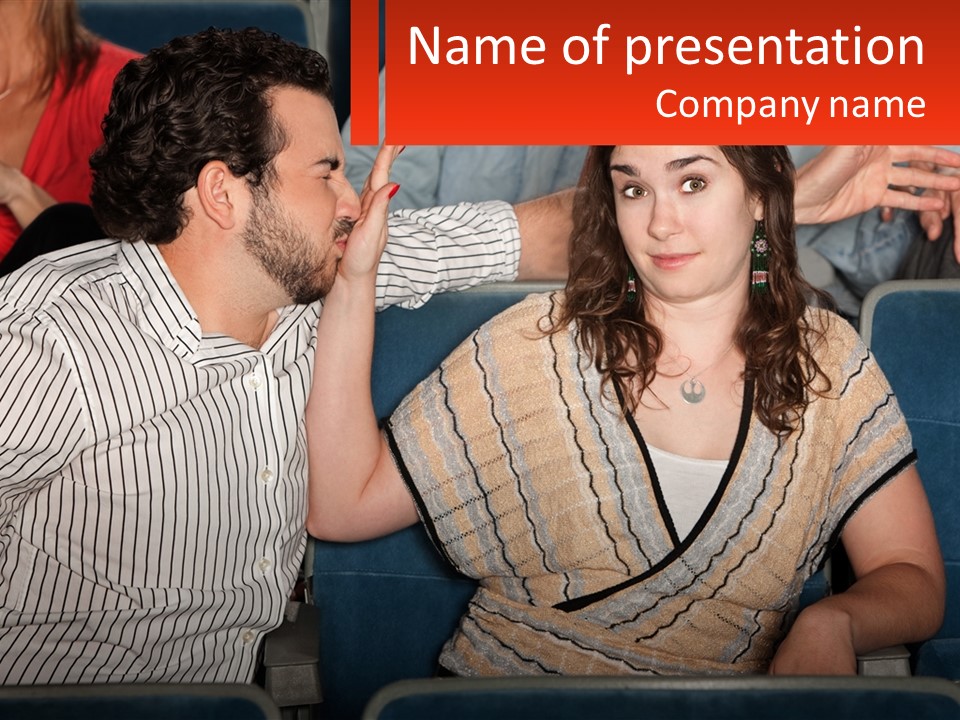 A Man And Woman Sitting Next To Each Other PowerPoint Template