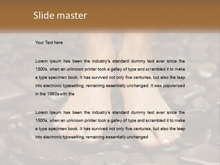A Woman's Bare Feet On Rocks With A Name Plate PowerPoint Template