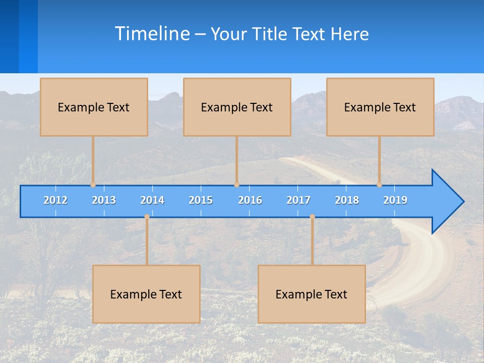 A Dirt Road In The Middle Of A Mountain Range PowerPoint Template