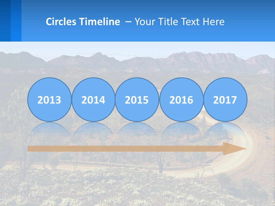 A Dirt Road In The Middle Of A Mountain Range PowerPoint Template