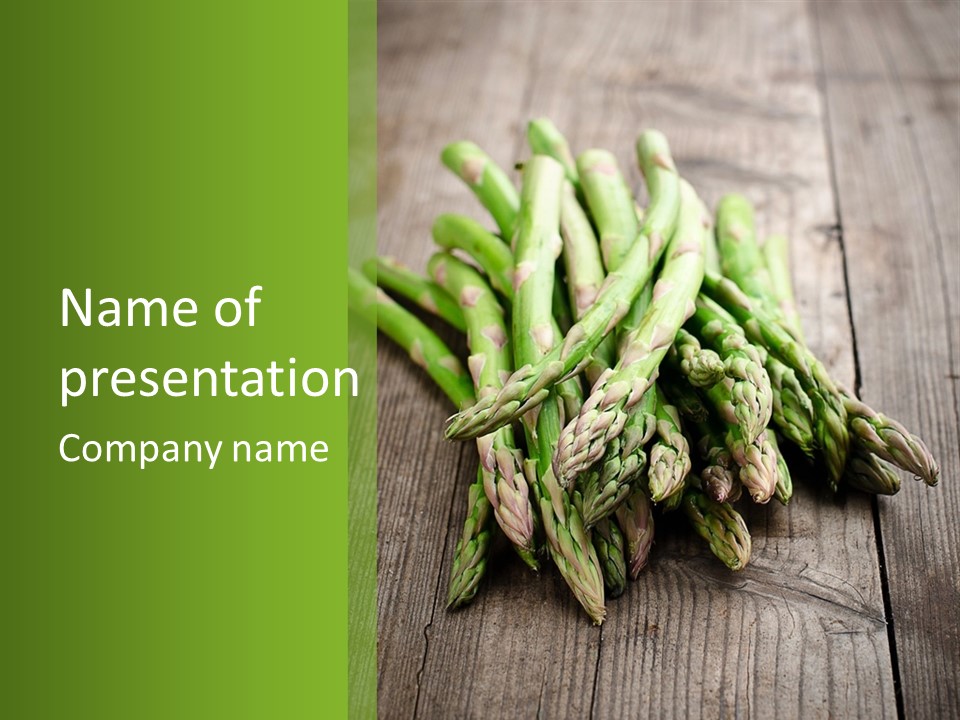 A Pile Of Asparagus On A Wooden Table PowerPoint Template