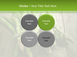 A Pile Of Asparagus On A Wooden Table PowerPoint Template