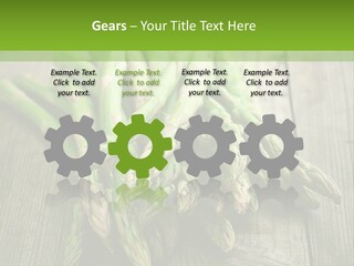 A Pile Of Asparagus On A Wooden Table PowerPoint Template
