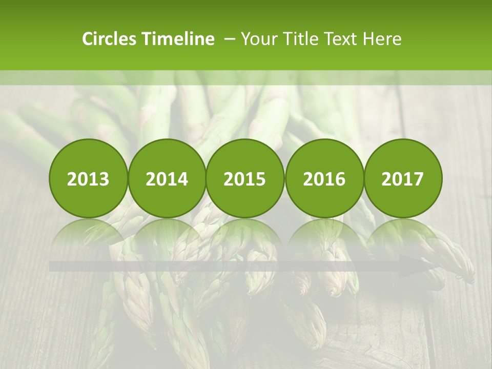 A Pile Of Asparagus On A Wooden Table PowerPoint Template