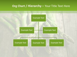 A Pile Of Asparagus On A Wooden Table PowerPoint Template