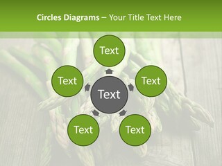 A Pile Of Asparagus On A Wooden Table PowerPoint Template