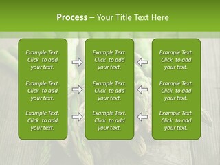 A Pile Of Asparagus On A Wooden Table PowerPoint Template