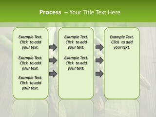 A Pile Of Asparagus On A Wooden Table PowerPoint Template