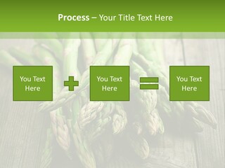 A Pile Of Asparagus On A Wooden Table PowerPoint Template