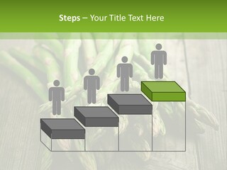 A Pile Of Asparagus On A Wooden Table PowerPoint Template