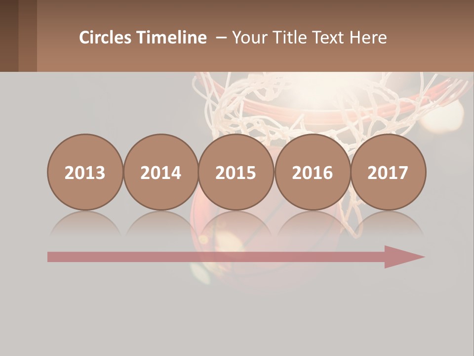 A Basketball Going Through The Net Of A Basketball Hoop PowerPoint Template