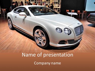 A White Car Is On Display In A Showroom PowerPoint Template