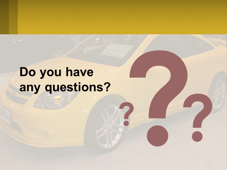 A Yellow Car Is On Display In A Showroom PowerPoint Template