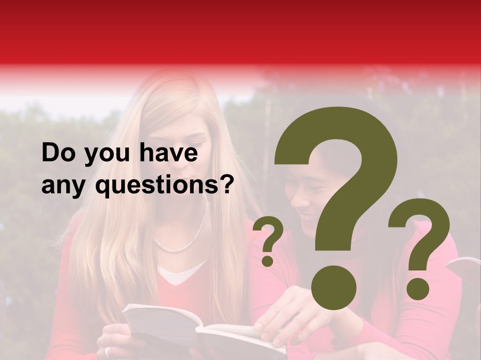 Two Women Are Looking At A Book Together PowerPoint Template