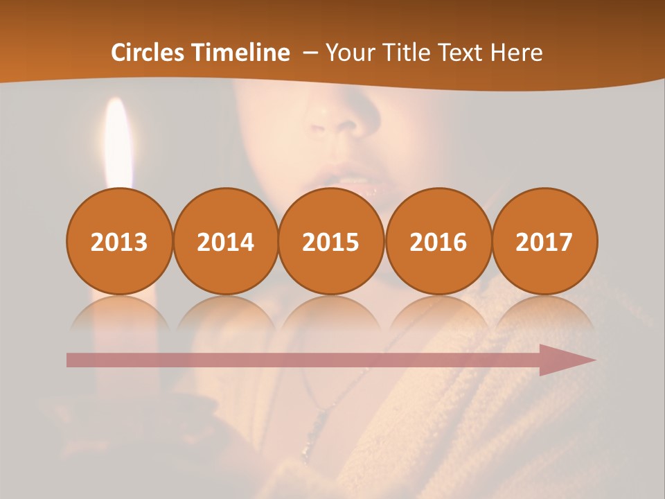 A Young Girl Holding A Lit Candle In Her Hands PowerPoint Template