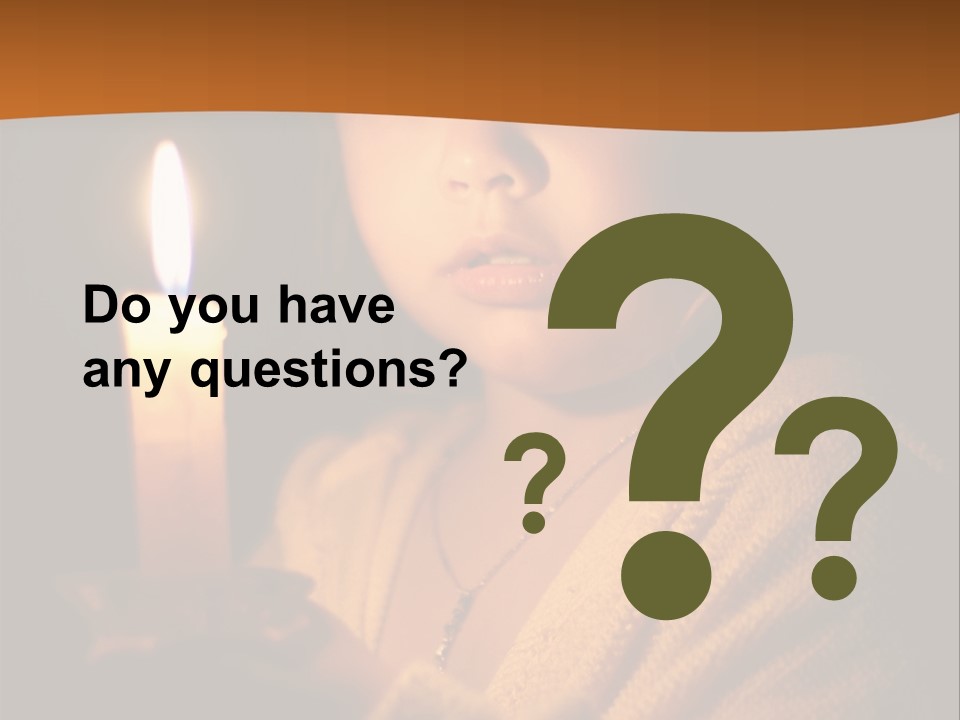 A Young Girl Holding A Lit Candle In Her Hands PowerPoint Template