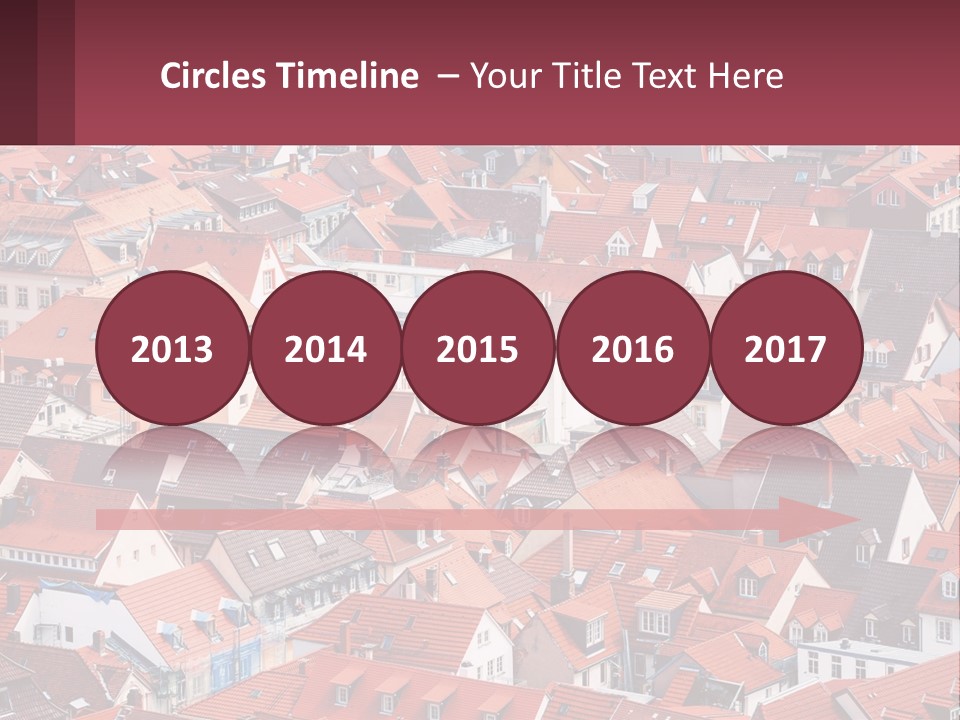 A Large Group Of Buildings With Red Roofs PowerPoint Template