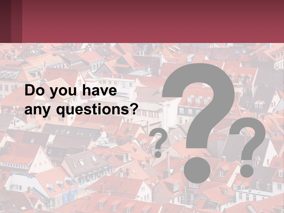 A Large Group Of Buildings With Red Roofs PowerPoint Template