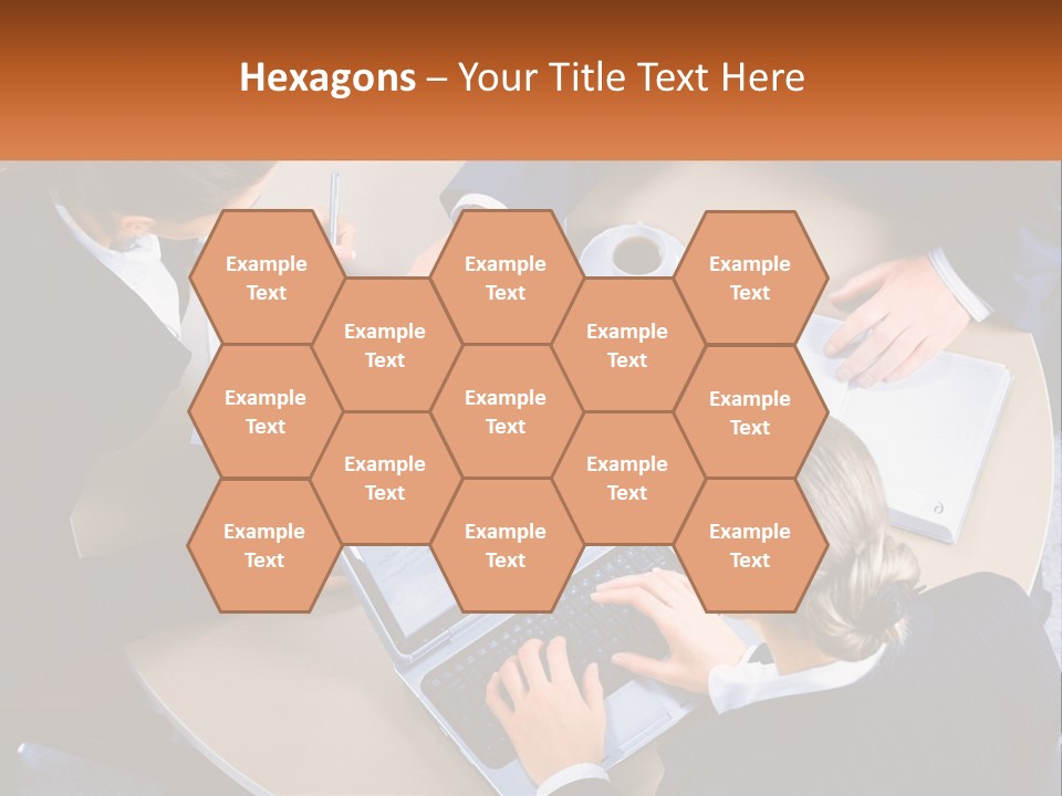 A Group Of People Sitting At A Table Working On Laptops PowerPoint Template