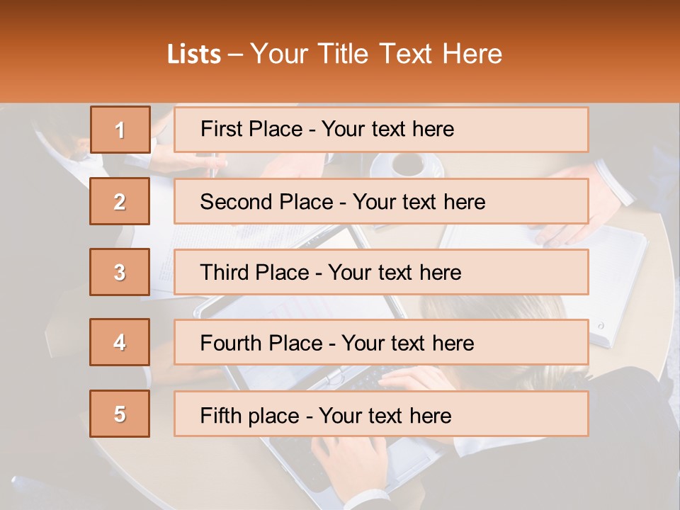 A Group Of People Sitting At A Table Working On Laptops PowerPoint Template