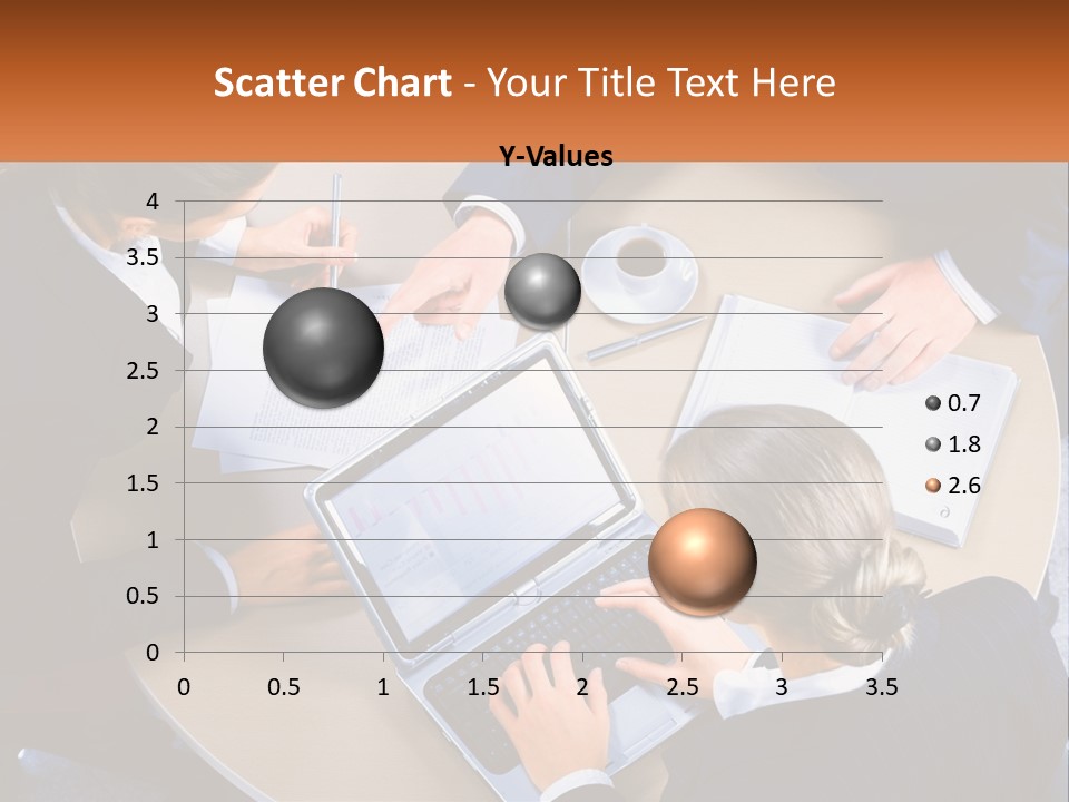 A Group Of People Sitting At A Table Working On Laptops PowerPoint Template
