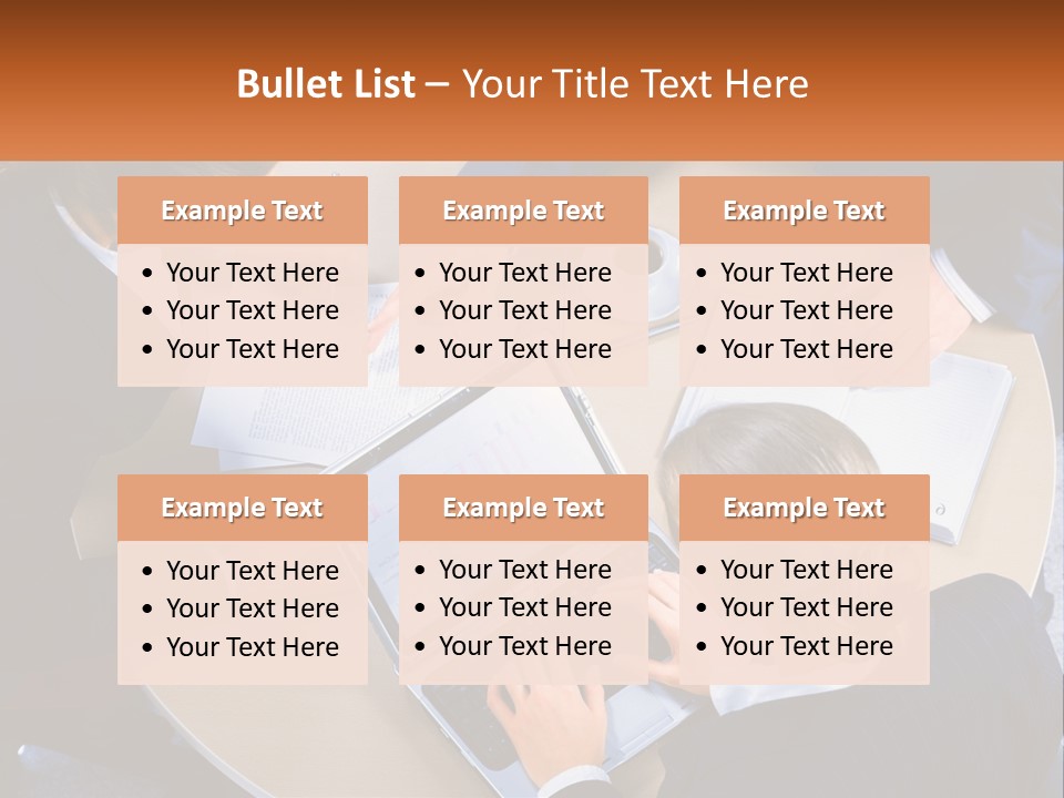 A Group Of People Sitting At A Table Working On Laptops PowerPoint Template