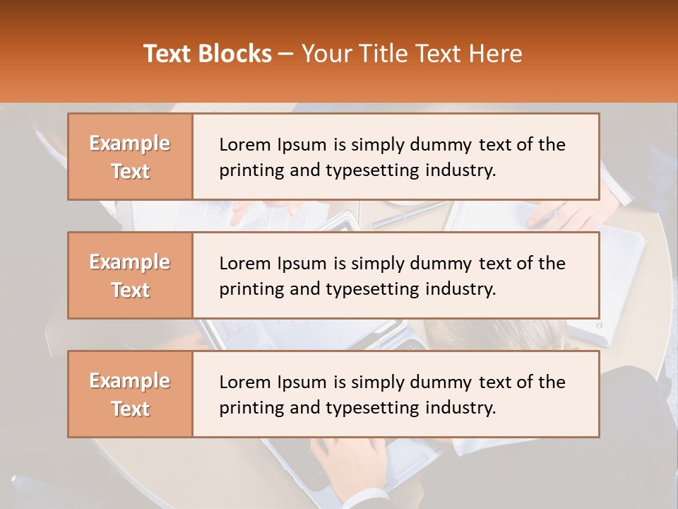 A Group Of People Sitting At A Table Working On Laptops PowerPoint Template