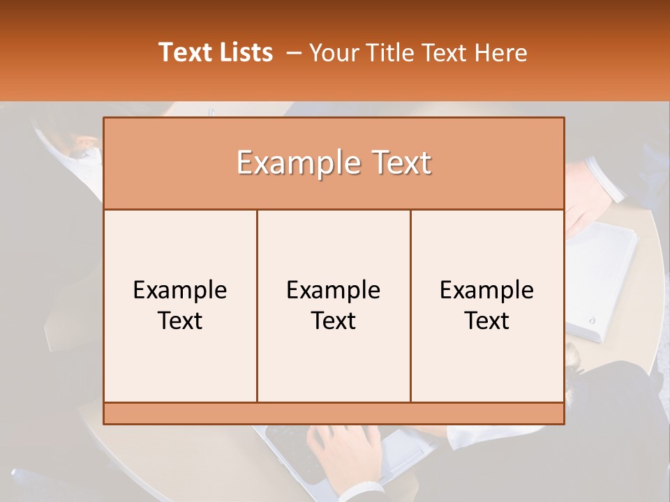 A Group Of People Sitting At A Table Working On Laptops PowerPoint Template
