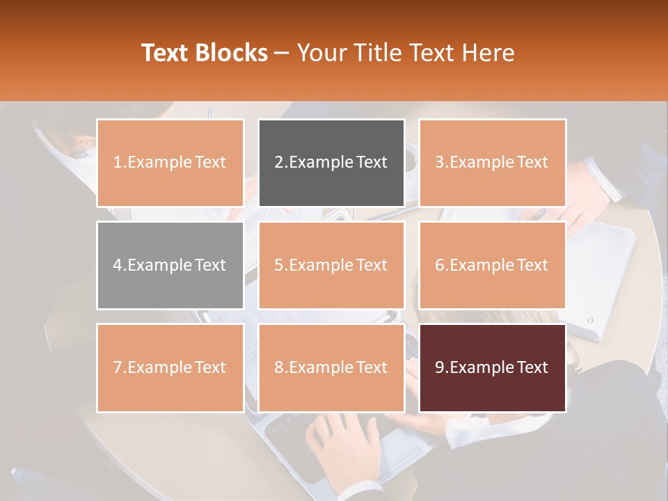 A Group Of People Sitting At A Table Working On Laptops PowerPoint Template