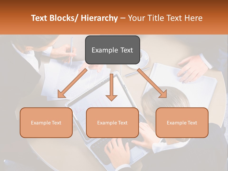 A Group Of People Sitting At A Table Working On Laptops PowerPoint Template