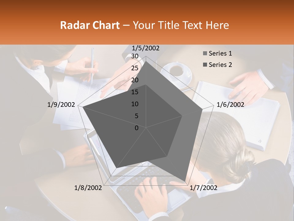 A Group Of People Sitting At A Table Working On Laptops PowerPoint Template