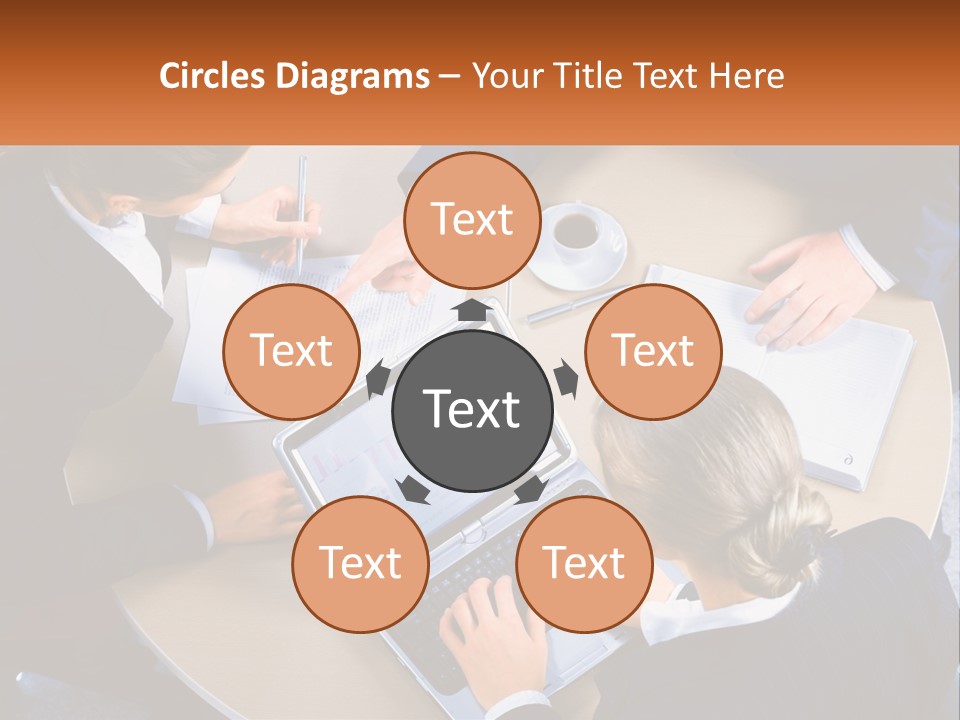 A Group Of People Sitting At A Table Working On Laptops PowerPoint Template