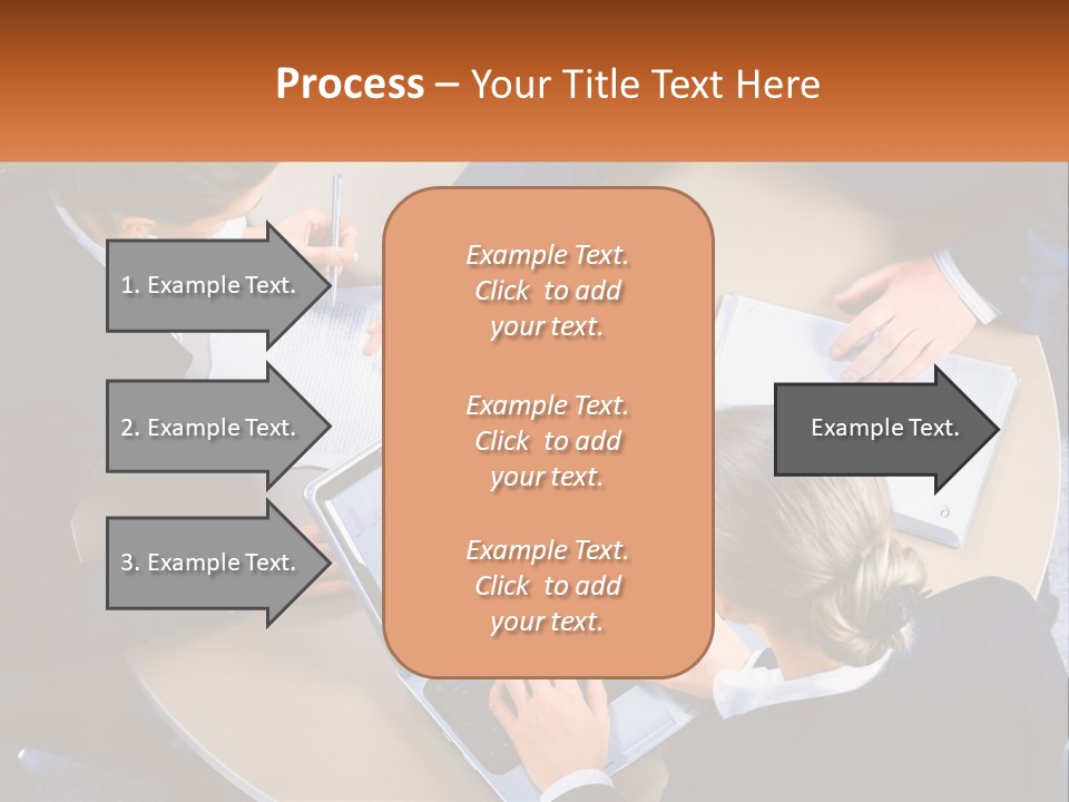 A Group Of People Sitting At A Table Working On Laptops PowerPoint Template