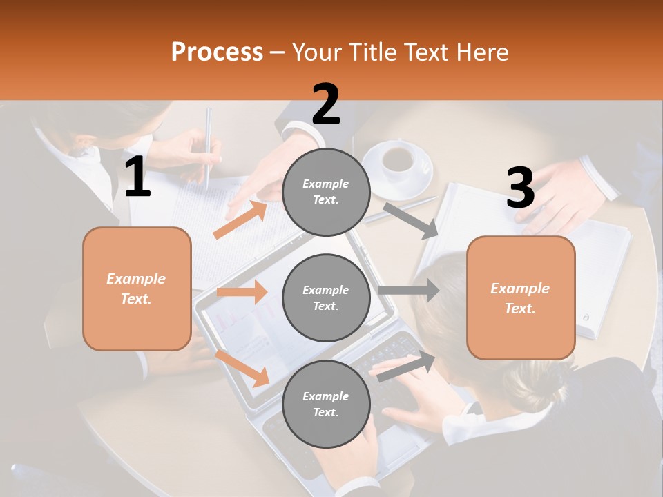 A Group Of People Sitting At A Table Working On Laptops PowerPoint Template