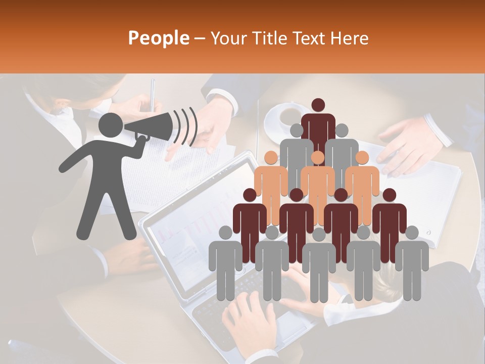 A Group Of People Sitting At A Table Working On Laptops PowerPoint Template