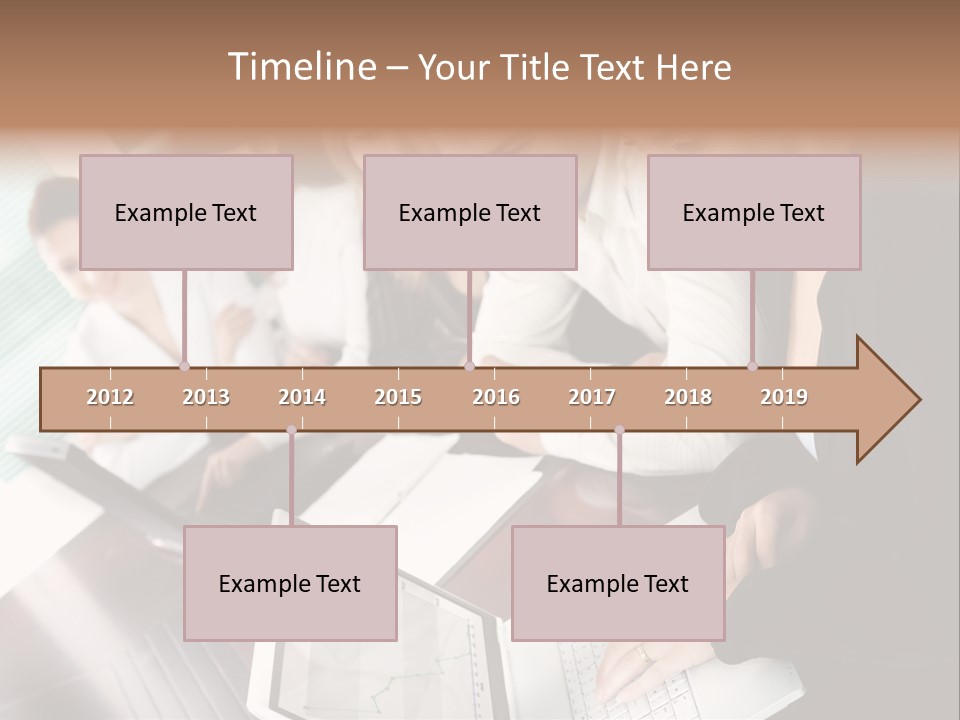 A Group Of People Sitting At A Table With Laptops PowerPoint Template