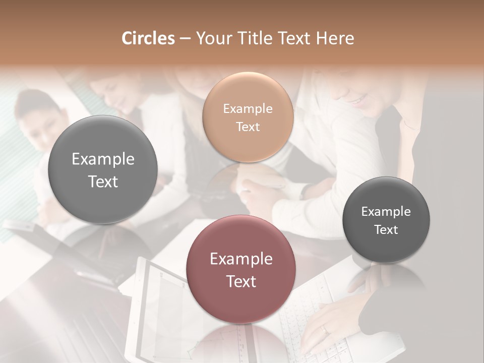 A Group Of People Sitting At A Table With Laptops PowerPoint Template