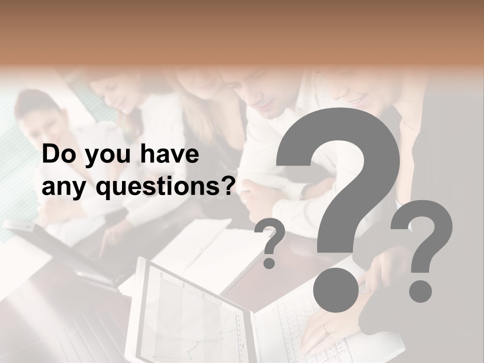 A Group Of People Sitting At A Table With Laptops PowerPoint Template