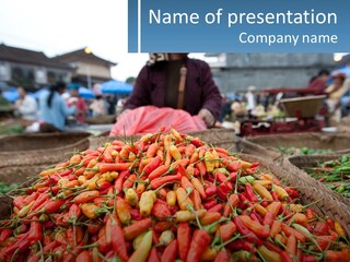 A Large Pile Of Red And Yellow Peppers PowerPoint Template