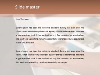 A Person Pointing At A Computer Screen On A Desk PowerPoint Template