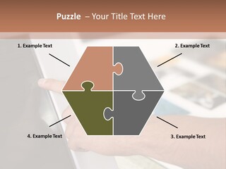 A Person Pointing At A Computer Screen On A Desk PowerPoint Template