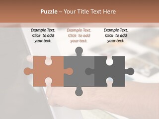 A Person Pointing At A Computer Screen On A Desk PowerPoint Template