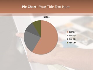 A Person Pointing At A Computer Screen On A Desk PowerPoint Template